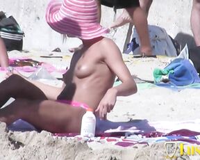 Beautiful busty Anna and hot chick Nadine at the nude beach
